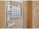 Bathroom featuring a shower with glass block window at 9220 Hidden Water Cir, Riverview, FL 33578