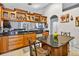 Beautiful kitchen featuring granite counters, stainless appliances and wine storage at 9220 Hidden Water Cir, Riverview, FL 33578