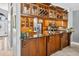 Bright kitchen with custom cabinetry, granite countertops, stainless steel appliances, and an open design at 9220 Hidden Water Cir, Riverview, FL 33578