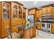 Kitchen features granite countertops, stainless steel appliances, and custom cabinetry at 9220 Hidden Water Cir, Riverview, FL 33578
