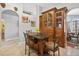 Kitchen featuring custom cabinetry, island with seating, and open access to other areas at 9220 Hidden Water Cir, Riverview, FL 33578