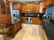 Spacious kitchen with custom cabinetry, stainless steel appliances, and an island with seating at 9220 Hidden Water Cir, Riverview, FL 33578