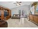 Cozy living room with tile flooring, large windows, and comfortable seating at 9220 Hidden Water Cir, Riverview, FL 33578