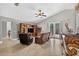The living room offers tile floors, vaulted ceilings, and a sliding door to the pool at 9220 Hidden Water Cir, Riverview, FL 33578