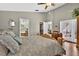 Spacious main bedroom with sitting area, walk-in closet and ensuite bathroom at 9220 Hidden Water Cir, Riverview, FL 33578