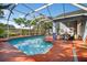 Enjoy the Florida lifestyle with this refreshing screened-in pool and outdoor patio, perfect for entertaining at 9220 Hidden Water Cir, Riverview, FL 33578