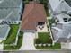 Aerial view of a single-Gathering home with a patio, fenced yard, and well-maintained landscaping at 10015 Brompton Dr, Tampa, FL 33626