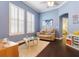 Bright bonus room features hardwood floors, neutral paint and plantation shutters at 10015 Brompton Dr, Tampa, FL 33626