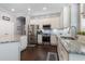 A well-equipped kitchen features stainless steel appliances and beautiful granite countertops at 10015 Brompton Dr, Tampa, FL 33626