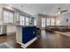 Spacious living room with modern finishes, hardwood floors, and large windows with plantation shutters at 10015 Brompton Dr, Tampa, FL 33626