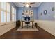 Bright home office with hardwood floors, natural light, and modern decor at 10015 Brompton Dr, Tampa, FL 33626