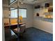 Cozy office with a window and a desk at 1039 Greenturf Rd, Spring Hill, FL 34608