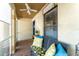 Inviting porch with decorative pillows, a ceiling fan, and welcoming accents, creating a cozy outdoor space at 11996 117Th St, Seminole, FL 33778