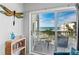 Cozy balcony with seating and beautiful ocean views at 12000 Gulf Blvd # 506N, Treasure Island, FL 33706