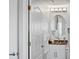 Modern bathroom with a vanity, mirror, and fresh towels at 12000 Gulf Blvd # 506N, Treasure Island, FL 33706