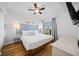 Bright bedroom with a large bed and beach-themed decor at 12000 Gulf Blvd # 506N, Treasure Island, FL 33706