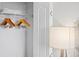 Organized closet with wooden hangers and fresh towels at 12000 Gulf Blvd # 506N, Treasure Island, FL 33706