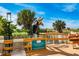 Deck with a statue of a dolphin and views of the tropical landscaping at 12000 Gulf Blvd # 506N, Treasure Island, FL 33706