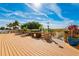 Outdoor deck with lounge chairs, tropical plants, and ocean views at 12000 Gulf Blvd # 506N, Treasure Island, FL 33706