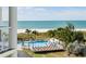 Enjoy the pool with lounge chairs and a view of the beach and ocean at 12000 Gulf Blvd # 506N, Treasure Island, FL 33706