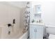 Standard bathroom with a tub and shower combo, a vanity, and a toilet at 12037 1/2 Murray Ave, Seminole, FL 33778