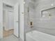 This bathroom features a bathtub, a shower, and gold fixtures at 12092 97Th Ave, Seminole, FL 33772