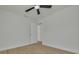 A bedroom features a doorway and wood-look floors at 12092 97Th Ave, Seminole, FL 33772