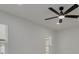 A bedroom features a modern ceiling fan, recessed lights, and a bright, neutral color scheme at 12092 97Th Ave, Seminole, FL 33772