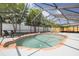 Large screened-in pool area with brick trim and ample seating, perfect for entertaining at 12092 97Th Ave, Seminole, FL 33772