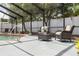 Inviting screened-in pool area with comfortable seating and lush landscaping at 12092 97Th Ave, Seminole, FL 33772