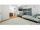 Large bedroom featuring two beds, and access to an outdoor area with a ceiling fan at 1242 Whisper Dr, Largo, FL 33770