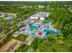 Aerial view of the community pool, water slides, and a recreation area at 1242 Whisper Dr, Largo, FL 33770