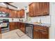 Close-up of the modern kitchen with stainless steel appliances and stylish countertops at 1242 Whisper Dr, Largo, FL 33770