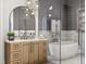 Luxurious bathroom features a soaking tub, marble countertops, and modern fixtures at 125 Avonwood, Tampa, FL 33625