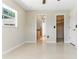 Bedroom with large closet and adjacent bath at 13883 Jamaica Dr, Seminole, FL 33776