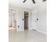 Bright bedroom featuring large closet and access to the en suite bathroom at 13883 Jamaica Dr, Seminole, FL 33776