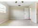 Empty bedroom with ceiling fan and natural light at 13883 Jamaica Dr, Seminole, FL 33776