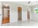 Bedroom with large closet and adjacent bath at 13883 Jamaica Dr, Seminole, FL 33776