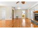 Spacious living room with hardwood floors, natural light, and a neutral color palette at 13883 Jamaica Dr, Seminole, FL 33776