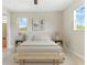 Well-lit bedroom with en suite bathroom at 13883 Jamaica Dr, Seminole, FL 33776