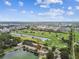 Stunning aerial view of townhouse located by lake and golf course at 1508 Adams E Cir, Largo, FL 33771