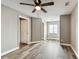 Large bedroom with sleek floors, ample natural light, and closet storage at 1508 Adams E Cir, Largo, FL 33771