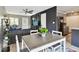 Dining area with table, adjacent to the kitchen and the living room at 1508 Adams E Cir, Largo, FL 33771