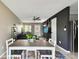 Cozy dining area open to living room providing seamless entertainment space at 1508 Adams E Cir, Largo, FL 33771