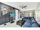 Inviting living room showcasing staircase and views of kitchen and dining area at 1508 Adams E Cir, Largo, FL 33771
