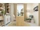 Bright office with a window, stylish decor, modern furniture, a table, and accent chair at 1554 Serenity Outlook Ct, Lutz, FL 33548
