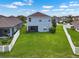 Spacious backyard with lush green lawn at 1821 Hawks View Dr, Ruskin, FL 33570