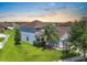 Beautiful two-story home with a well-kept lawn and mature landscaping for great curb appeal at 1821 Hawks View Dr, Ruskin, FL 33570