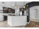 Eat in kitchen featuring granite countertops, stainless steel appliances and modern pendant lighting at 1821 Hawks View Dr, Ruskin, FL 33570