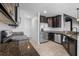 Well-appointed kitchen features a stainless steel refrigerator and granite countertops at 1821 Hawks View Dr, Ruskin, FL 33570